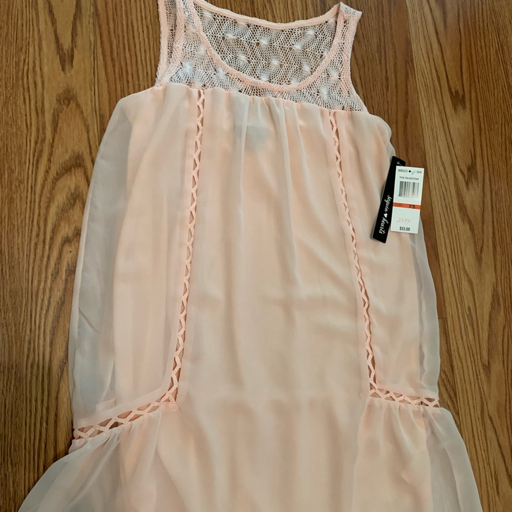 Sleeveless shear blouse